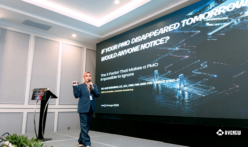 Membedah keberadaan dan dampak nyata PMO: Dr. Alin Veronika saat mempresentasikan "If Your PMO Disappeared Tomorrow, Would Anyone Notice?" di hadapan para peserta AveXchange 2026.